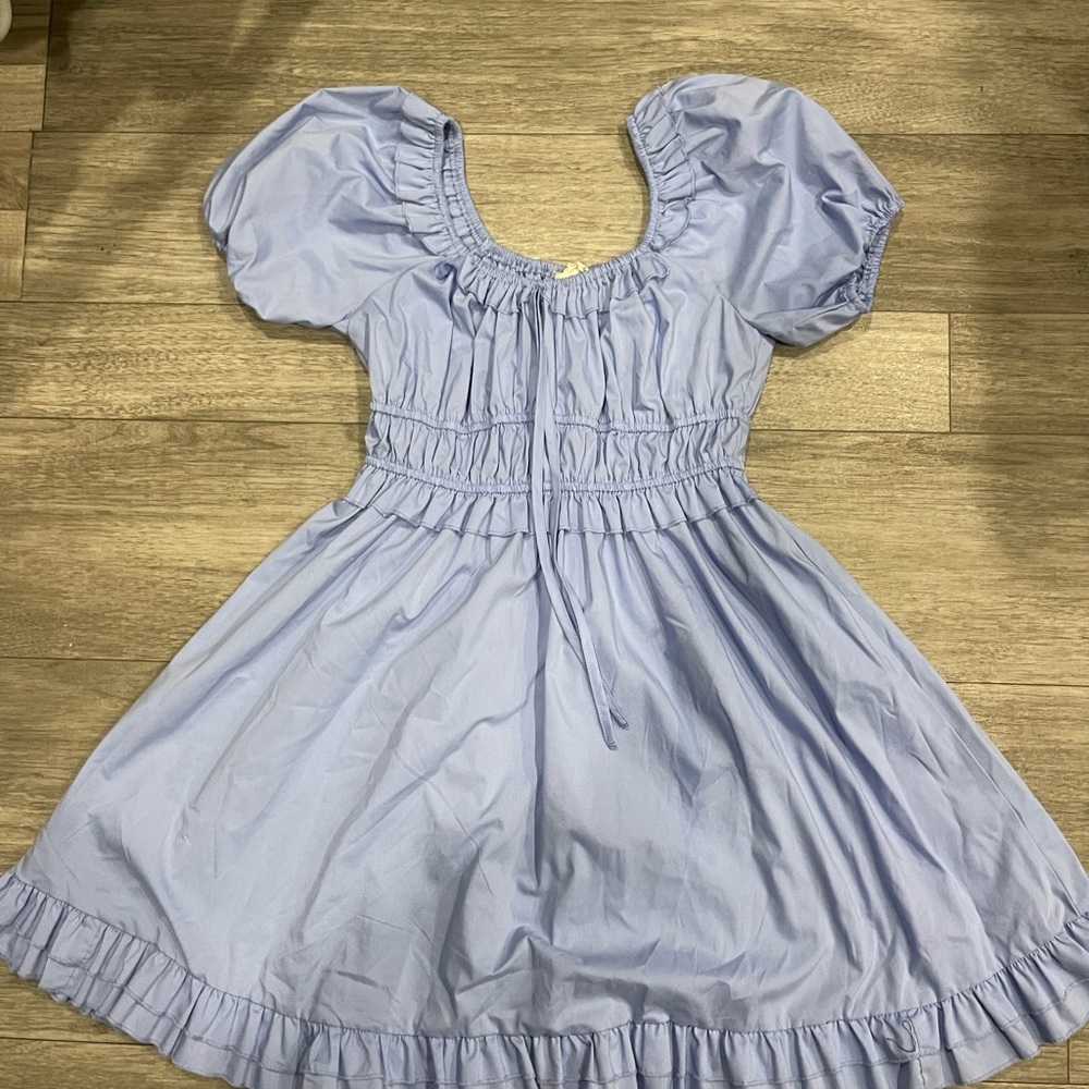 NWOT. Purchased for pictures & never worn. Size medium
